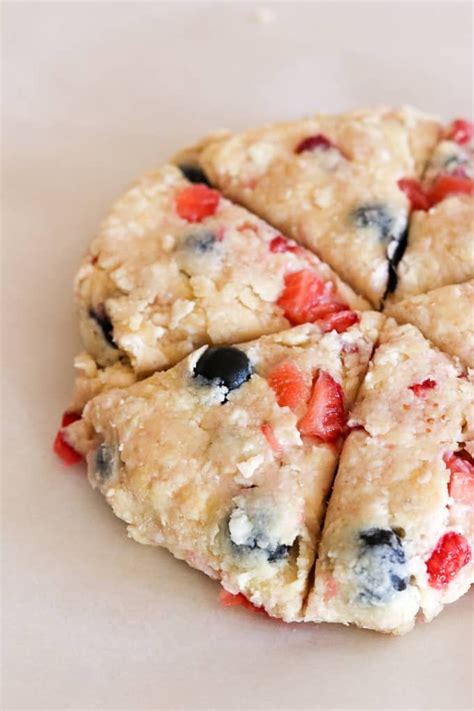 Mixed Berry Scones before baking on a parchment lined baking sheet ...