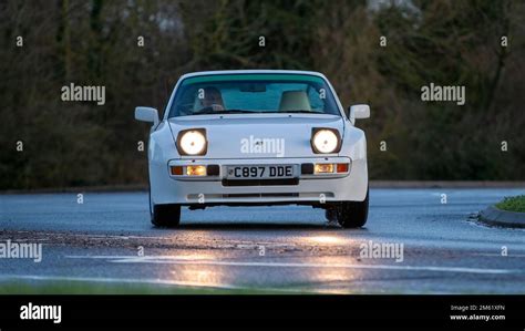 1985 white Porsche 944 classic car with pop up headlights on Stock ...