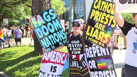 Handful of Westboro Baptist Church members greeted by huge group of ...