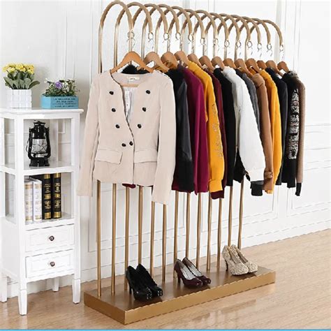 Aliexpress.com : Buy Standing clothing rack side against the wall to hang clothing store ...