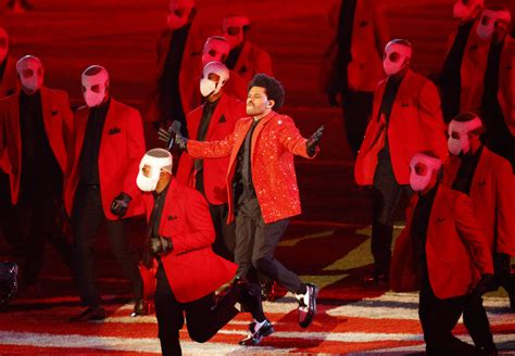 WATCH: The Weeknd brings bright lights, bandaged dancers in Super Bowl ...