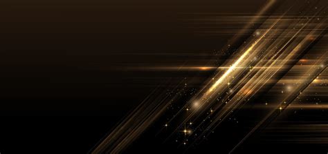 Abstract luxury golden glitter effect glowing on black background with lighting effect sparkle ...