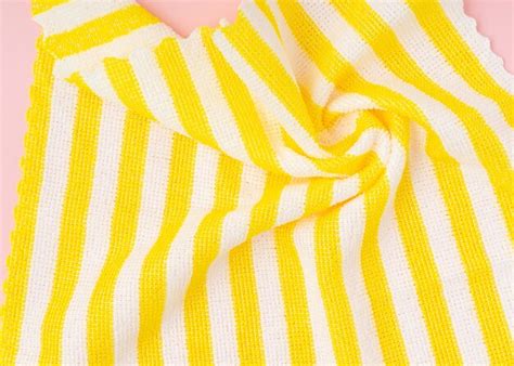 Premium Photo | Yellow striped fabric perfect for background.