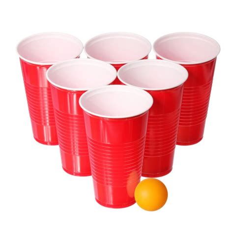 Beer pong. Red plastic cups and orange ping-pong ball isolated on white ...