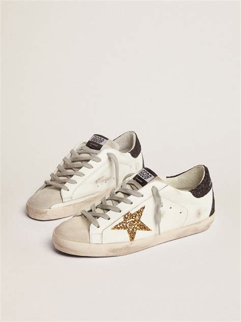 Super-Star sneakers with gold star and glittery black heel tab | Golden Goose