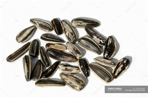 Raw Sunflower seeds — nutrition, aaa - Stock Photo | #153075460