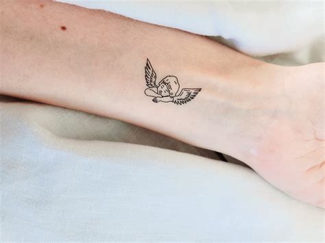 Sleeping Angel Baby Tattoo