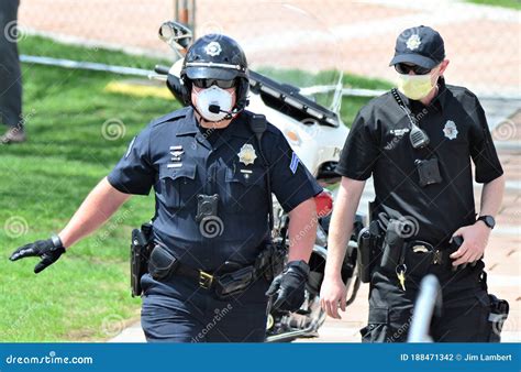 Denver Police Officers Getting Ready To Keep the Peace during the Riots ...