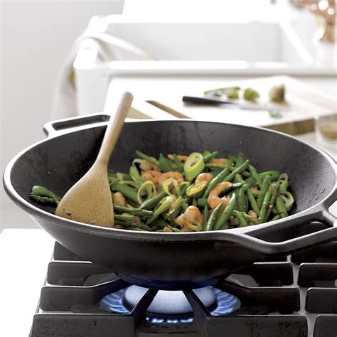 Lodge Cast Iron Wok + Reviews | Crate and Barrel | Lodge cast iron wok, Cast iron cooking, Cast ...