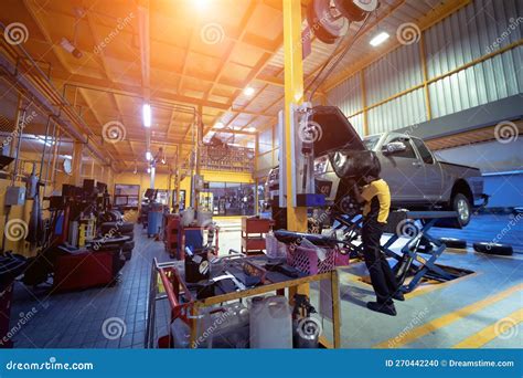 Car on Hydraulic Lift in Auto Repair Shop Stock Photo - Image of work, rubber: 270442240