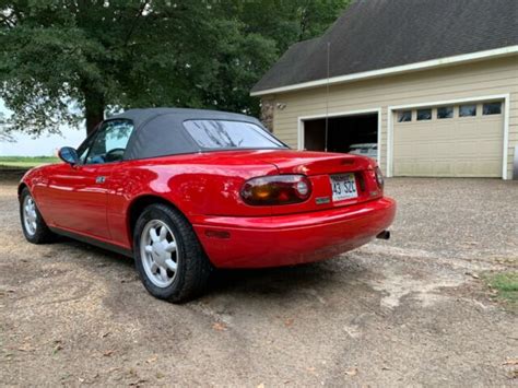 1990 red Mazda Miata convertible. Rebuilt title 72,417 miles good ...