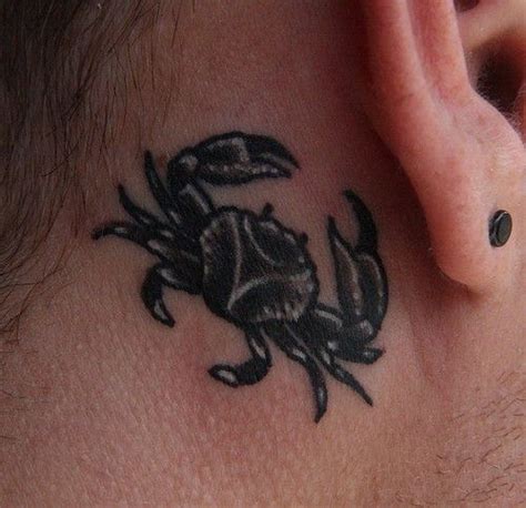 Black crab tattoo behind ear for lady | Crab tattoo, Tattoos for women, Tattoos