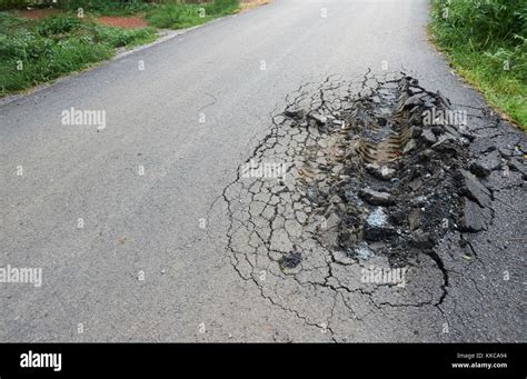 asphalt road with cracks Stock Photo - Alamy