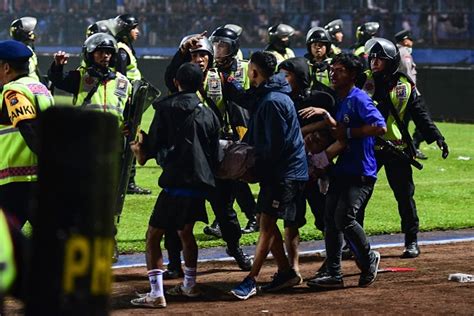 Indonesia police say 6 facing criminal charges over soccer stampede