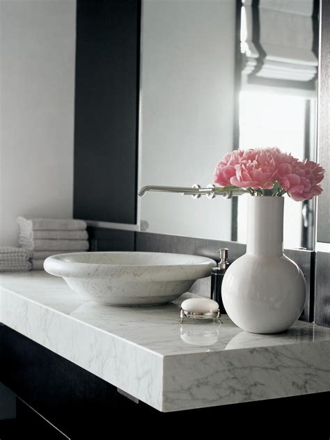 timeless elegance marble countertop is a favorite for high end baths this white venatino marble ...