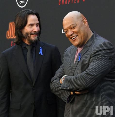 Photo: Keanu Reeves and Laurence Fishburne Attend the "John Wick: Chapter 4" Premiere in Los ...