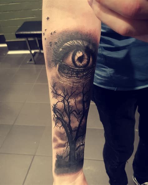 First tattoo. Dead tree and eye realism by Angie at Diabolik, Newcastle ...