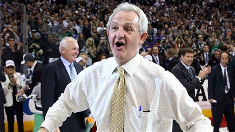 Darryl Sutter and Darryl Sutter's face hoist the Stanley Cup - SBNation.com