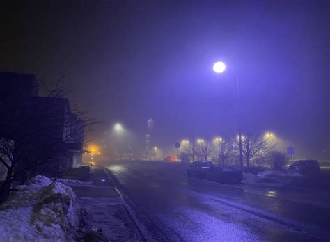 Why are some of Juneau's street lights glowing purple?