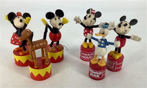 Lot - 6 Disney wooden push puppets. 2 Mickey, 2 Minnie, Pluto and Donald