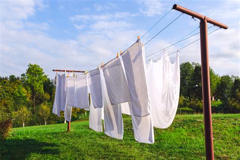 Linen Hanging On The Clothesline And Dried Stock Photo - Download Image Now - iStock