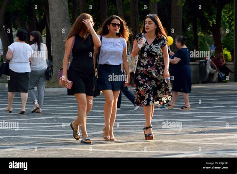 People walking on the Fountains Square in Baku Stock Photo - Alamy