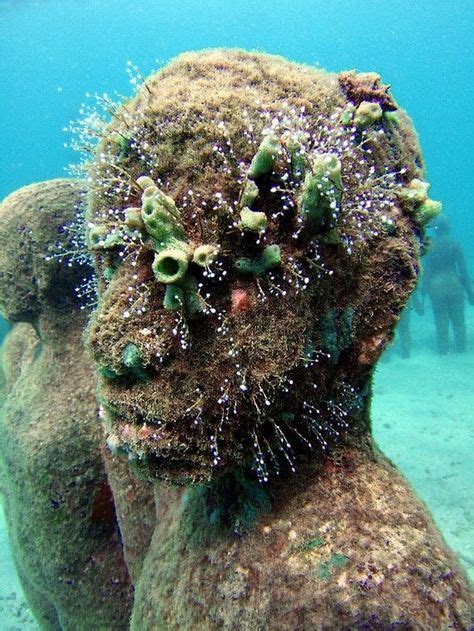 There are tons of statues under the ocean in Cancun, and it just gives me chills. Image detail ...