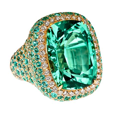 Margot McKinney Couture Jeweller - Sublime is a unique Green Tourmaline 27.94ct, surrounded by ...