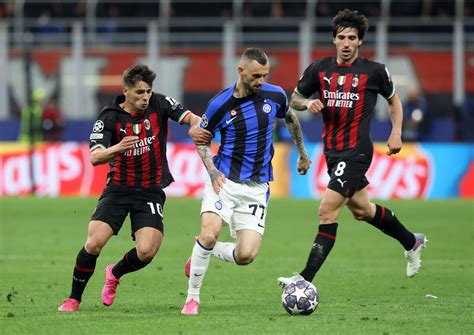 Milan, Inter battle on two fronts for Champions League qualification | Reuters