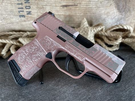 Sig Sauer P365 3.1” 9mm, Engraved Rose Gold - NEW! - harveysauctions.com