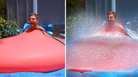 VIDEO: Watch as this giant water balloon pops in slow motion with man inside - ABC7 Los Angeles