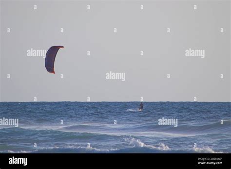 Kitesurfing surfer on the beach in Tel Aviv Stock Photo - Alamy