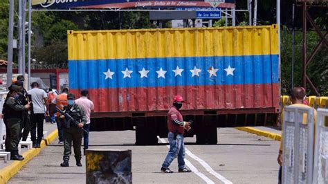 Venezuela opens border with Colombia after more than two years