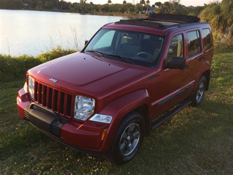 2008 JEEP LIBERTY - SKY SLIDER, APPEARANCE GROUP, INFERNO RED/SLATE GRAY