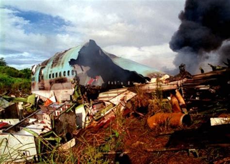 The wreckage of Korean Airlines flight 801 burns.