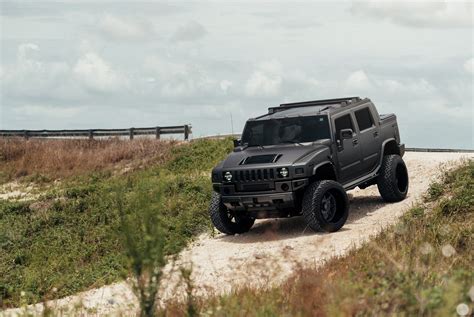 Mean-looking Hummer H2 SUT With a Lift and Fuel Off-road Wheels | Hummer h2, Hummer, Hummer truck