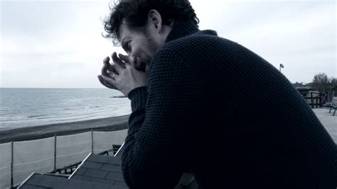 Sad Lonely Angry Man In Front Of The Ocean In Winter 4K Dolly Shot With ...