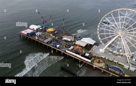 ATLANTIC CITY NJ, UNITED STATES - Sep 13, 2021: An aerial view of amusement rides and Ferris ...