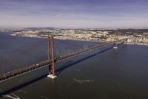 Aerial View of April 25th Bridge Crossing the Tagus River in Lisbon ...