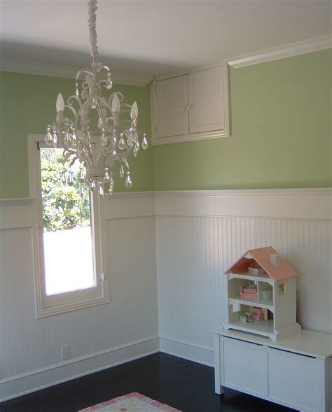 The upstairs bedrooms....using beadboard. I love how tall the beadboard ...