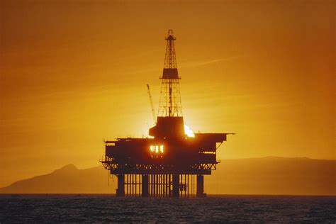 Offshore Oil Rig At Sunset Photograph by Jack Fields - Fine Art America