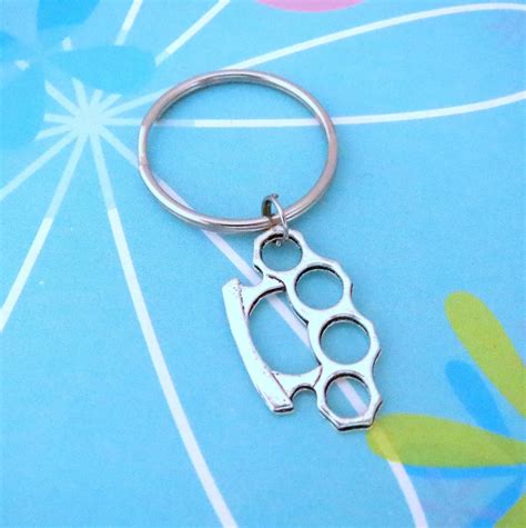 Brass Knuckles Keychain Zipper Pull Clip-On Charm Dust