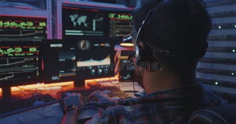 Hacker Using Computer With Multiple Monitors Stock Photo - Image of ...