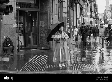 Umbrella rain Black and White Stock Photos & Images - Alamy