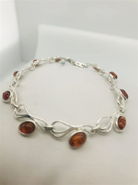 Swirl design Baltic amber bracelet - Krikis Jewelers