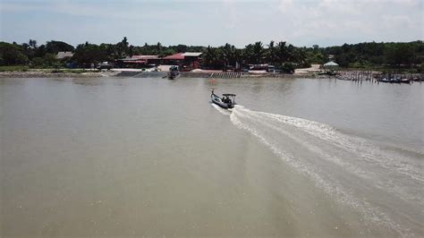 Aerial fishing boat move to Jetty Kuala Muda at Kedah. 8927071 Stock Video at Vecteezy