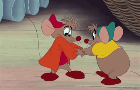 two cartoon mice holding hands in the middle of a room with dr seusst's hat on