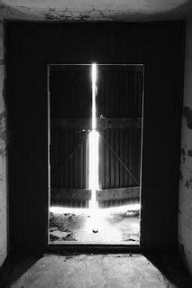 Light shining through partially opened doors | Fort DuPont M… | Flickr
