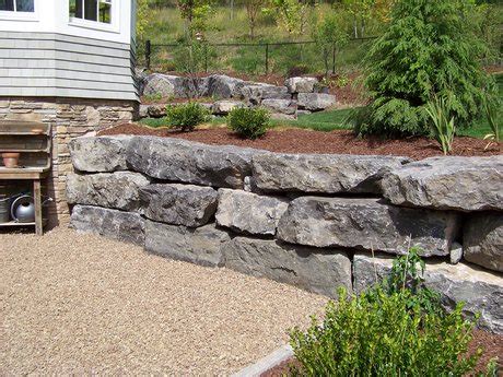 Aspinall's Landscaping Boulder Wall Construction - Syracuse, NY