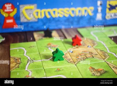 Viersen, Germany - May 9. 2021: Closeup of tile based original strategy board game Carcassonne ...